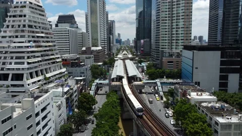 BTS skytrain aerial panoramic view in Silom area, Bangkok, Thailand 4K Stock Footage 211579612
