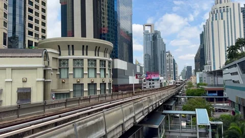 BTS Skytrain and Financial District Skyline of Bangkok. Bangkok Cityscape Stock Footage 277807310