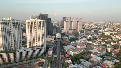 BTS Skytrain and high-rise buildings in Bangkok, Thailand Stock Footage 255560696