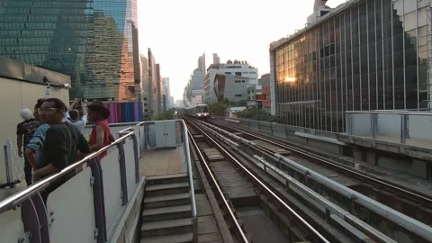 BTS Skytrain Arriving at Sala Daeng Station During Songkran Festival-002 스톡 동영상 333036026