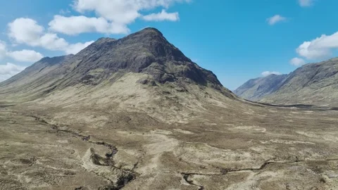 Buachaille Etive Beag and Three Sisters in Glencoe over Moors, Scotland, UK Stock Footage 308675994