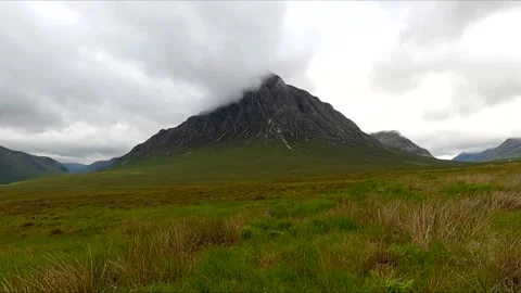 Buachaille Etive Mor mountain with mist on summit Scotland UK Stock Footage 135745680