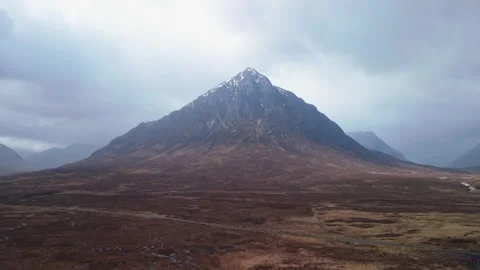 Buachaille Etive Mor pyramid peak rising over Glencoe moorland, Scottish Stock Footage 341315622