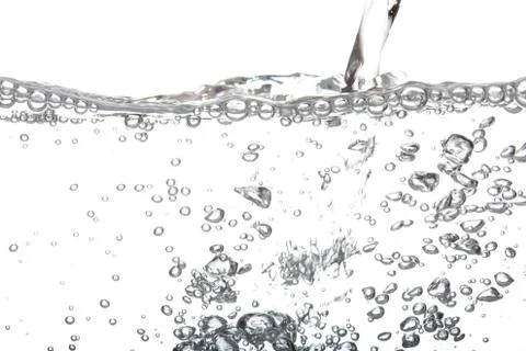 Bubble air of pour water isolated on white background. Stock Photos