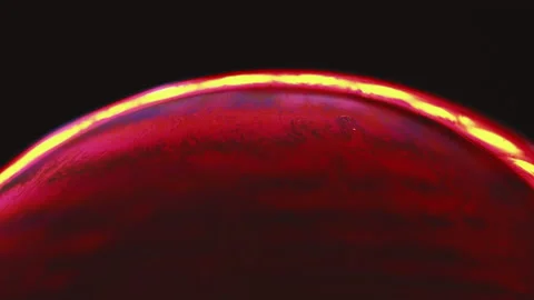 Bubble art soap magic macro space red bulb Stock Footage 233924462