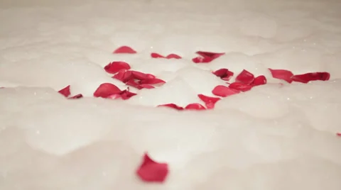 Bubble Bath with Rose Petals Stock Footage 36053289