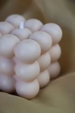Bubble candle, cube candle, soft pink color, soy wax Stock Photos