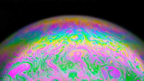 Bubble changed from multicolors to clear and then blown out Stock Footage 125562017