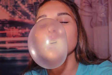 Bubble from chewing gum. Stock Photos
