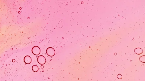 Bubble cluster, cells under a microscope. Transparent multicolor cosmetic gel Stock Footage 264579364