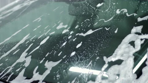 Bubble draining on the white car, specia... | Stock Video | Pond5