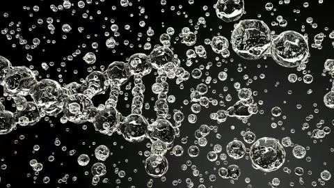 Bubble figures on a black background Stock Photos