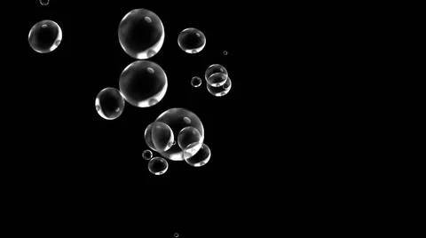 Bubble foam particle floating in air deep black sea background. Nature and... Stock Photos