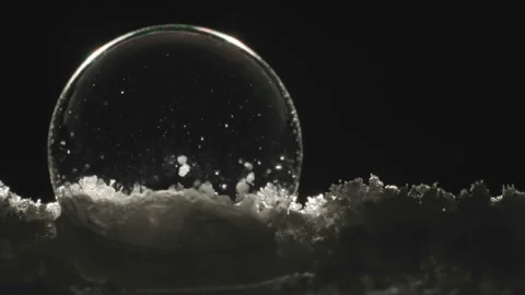 The bubble formed from the snow ground Stock Footage 147702682