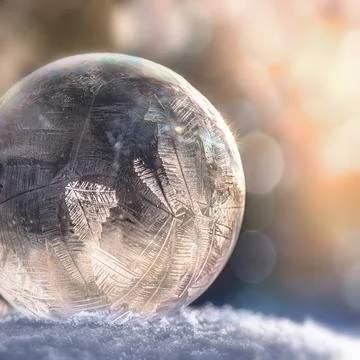 Bubble Frozen soap bubble with a unique pattern created by frost Copyright... Stock Photos