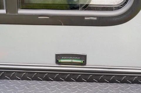 A bubble level attached to the side of a RV Stock Photos
