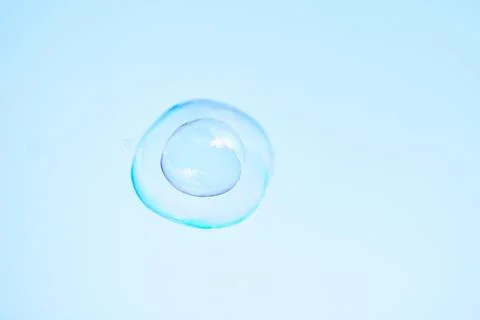 Bubble on a light blue color background Stock Photos