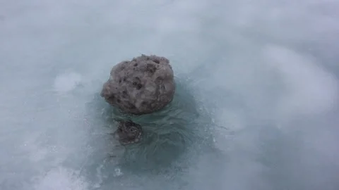Bubble oil rotating in an ice river in the spring Stock Footage 88395269