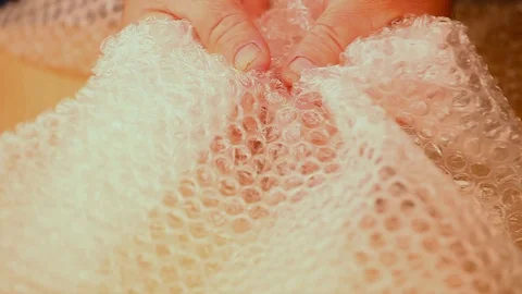 Bubble packing man hands hd footage Stock Footage 97589668