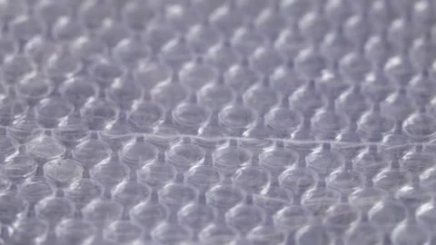 Bubble plastic packaging for the parcels. Stockbeeldmateriaal 142087712