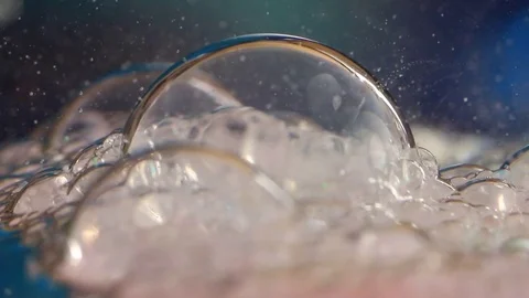 Bubble Pops in Slow Motion Stock Footage 75493596