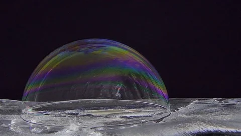 Bubble soap on ice. Video stock 118475080