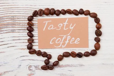 Bubble talk made of coffee beans with tasty coffee message. 写真素材