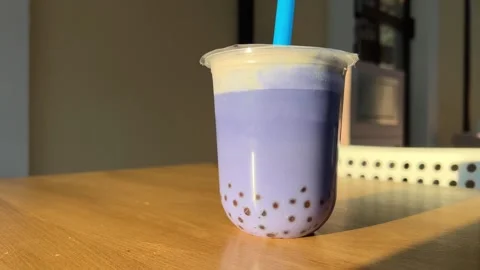 Bubble tea. Bubble tea drinks in plastic glass bubble tea, coffee, milk cocktail Stock Footage 247278095