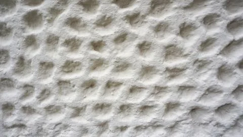Bubble texture on white cement wall finishing Stock Photos