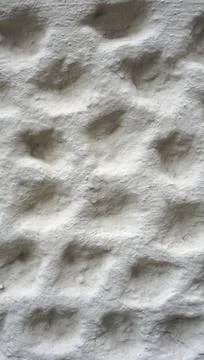 Bubble texture on white cement wall finishing Stock Photos