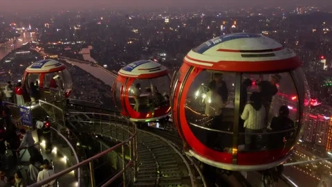 Bubble Tram car on top of Canton Tower, after sunset,4K Video stock 303251048