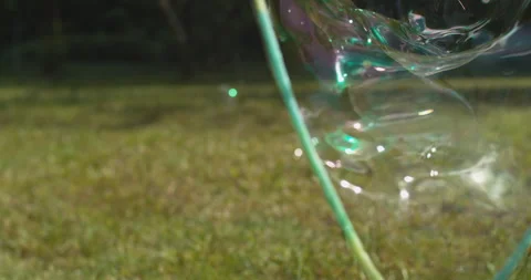 Bubble Tunnel forming and busting in super slow motion Stock Footage 154813057