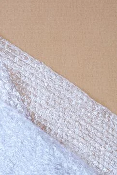 Bubble wrap with cardboard background Foto stock