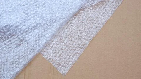 Bubble wrap with cardboard Stock Photos