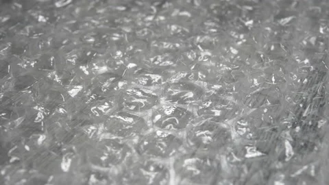 Bubble wrap glitters and rotates Stock Footage 155998153