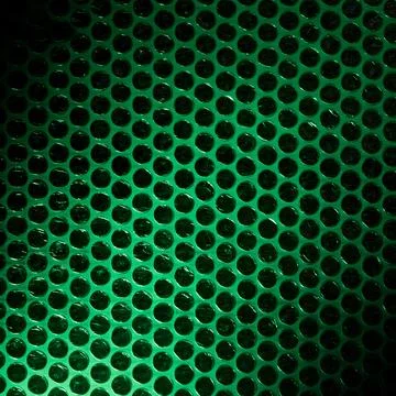 Bubble wrap lit by green light Stock Photos