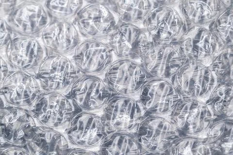 Bubble wrap macro photo with selective focus. Stock Photos
