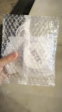 Bubble wrap package hand object technology industrial industry Stock Photos