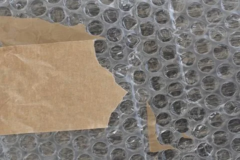 Bubble wrap plastic and adhesive tape background texture with copyspace Stock-Fotos