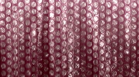 Bubble wrap red panning Stock Footage 44524494