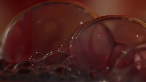 Bubbles Against Rust-Colored Background Stock Footage 75557689