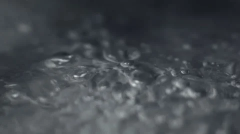 Bubbles in agitated boiling water Stock Footage
