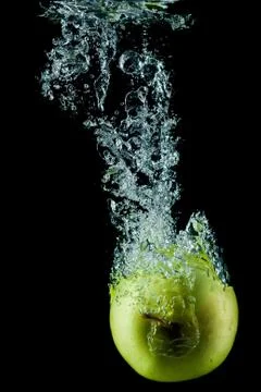 Bubbles and apple. Stock Photos