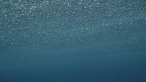 Bubbles and ripples on the surface of sea wave Stock Footage 108644396