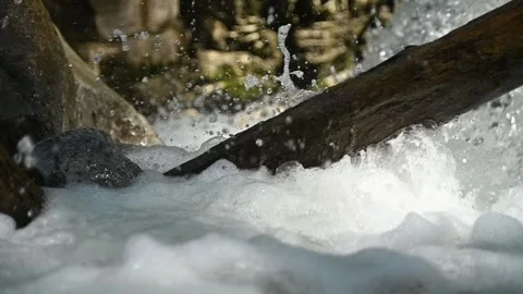Bubbles and squirting water from a mountain stream (slow motion) 스톡 동영상 260824494