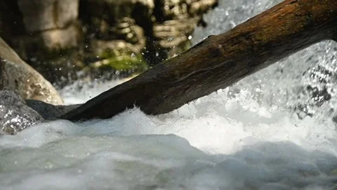 Bubbles and squirting water from a mountain stream (slow motion) Stock-Footage 260824495