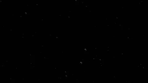 Bubbles appear on the surface of the glass and remain in place. Stock Footage 103556699