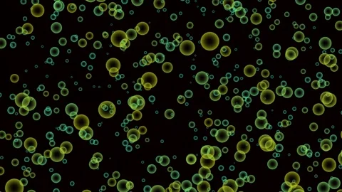 Bubbles ascend background in yellow and green. 库存影片 332089629