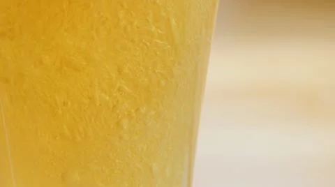 Bubbles in beer glass Stock Footage 12687111
