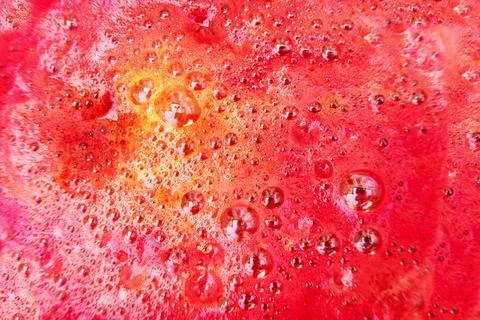 Bubbles on beetroot juice close-up, background, texture. Foto stock